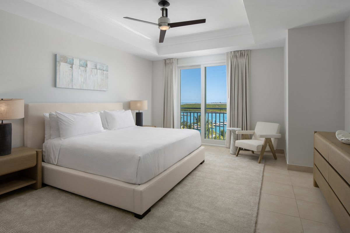 blue-haven-two-bedroom-oceanfront-balcony-penthouse-bedroom-signature