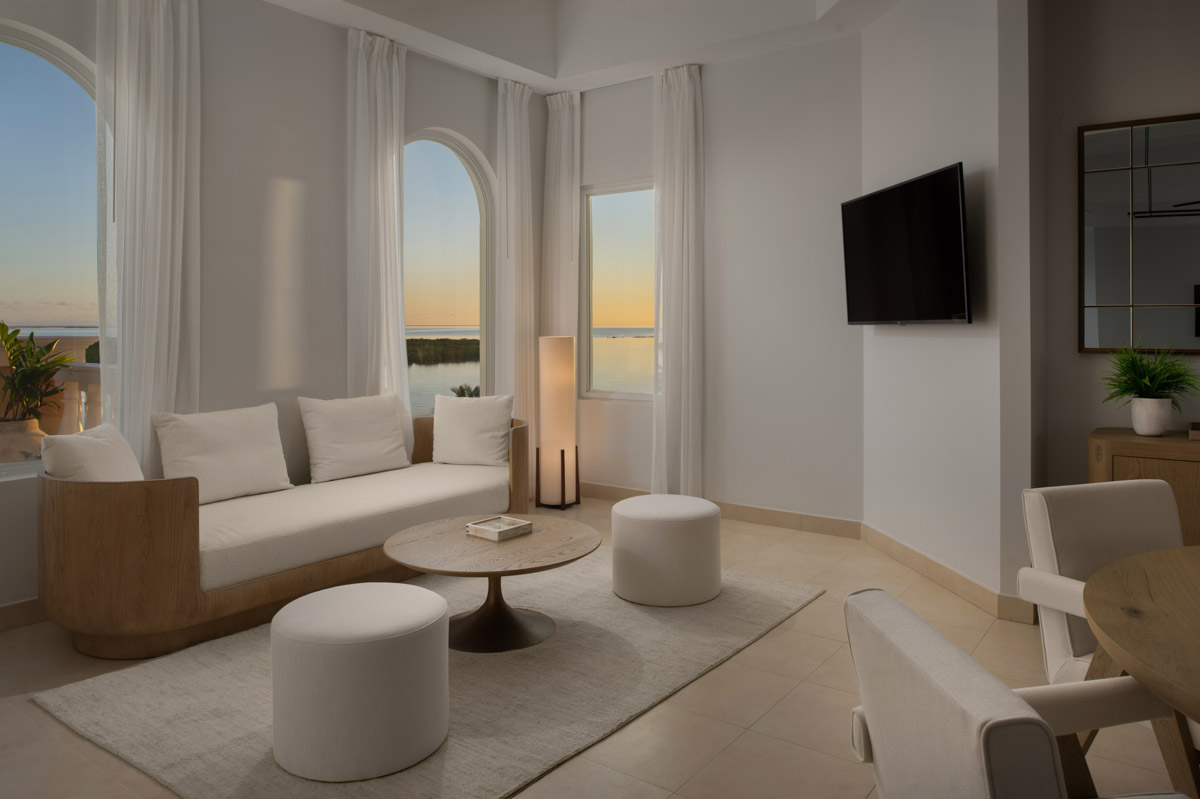 blue-haven-two-bedroom-oceanfront-balcony-penthouse-living-sunset
